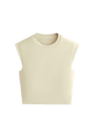 Bezruký béžový crop top s vypchávkami na ramenách a okrúhlym výstrihom, hladká pletená látka, priliehavý strih.