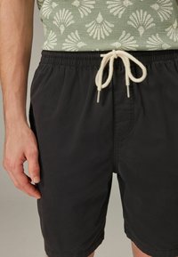 Next REGULAR FIT - Tréningruha alsók - black