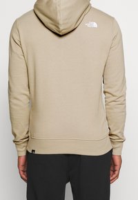 The North Face Felpa con cappuccio - beige