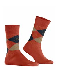 Czerwone skarpetki w wzór argyle z diamentowym motywem w beżowych i granatowych akcentach; materiał mieszanki bawełny; żebrowany mankiet dla dodatkowego komfortu.