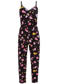 Combinaison noire à fleurs avec bretelles spaghetti ajustables, ornée de fleurs roses et jaunes, taille cintrée et jambes effilées.