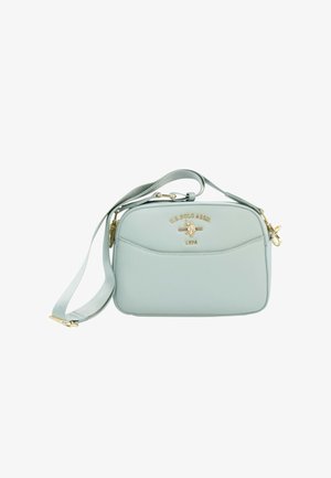 Borsa a tracolla rettangolare azzurro chiaro con tracolla regolabile e logo dorato U.S. Polo Assn. sul davanti.