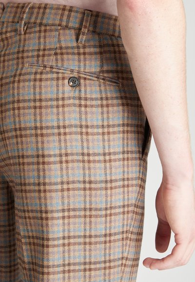 Bruine en blauwe geruite broeken van textuurstof, met een achterzak met een knoop, een getailleerde fit en een middelhoge taille.
