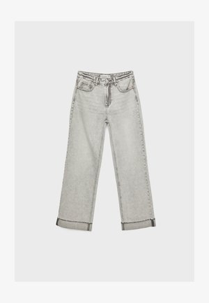 Jeans larghi in denim grigio con vita alta, orlo sfilacciato e cuciture a contrasto. Presenta cinque tasche e chiusura con bottone classico.