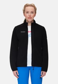 Black fleece jacket with a high collar, zippered pockets, and a soft texture. Features "Mammut" logo in white on the chest.