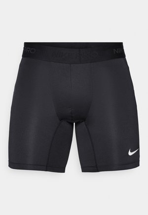 Schwarze Nike Pro Sportshorts mit eng anliegendem Design, glatter Textur und einem elastischen Bund mit geprägtem Branding. Weißes Logosymbol.