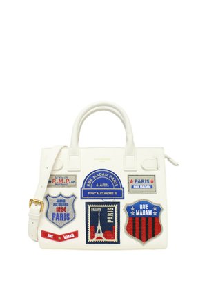 Borsa bianca con manici superiori e tracolla, decorata con patch ricamati colorati a tema Parigi e dettaglio fibbia dorata.