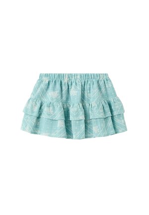 Jupe à volants bleu clair avec motifs floraux blancs et taille élastique, présentant des couches douces à volants.