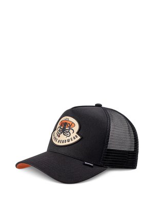 Black trucker cap with mesh back and front patch showing an orange hat and black octopus, labeled Djinns Headwear.