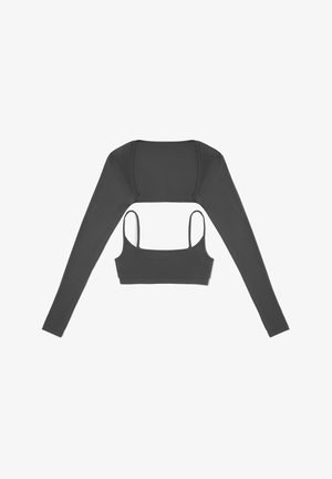 Tamsiai pilkas ilgarankovis trumpas viršus su prigludusia dizainu. Lygus paviršius, apvalus iškirpimas ir reguliuojamos špagetinės petnešos vidiniame sluoksnyje.