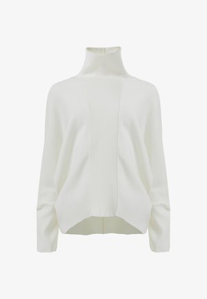 White sweater with a high mock neck, ribbed texture at the front, and dropped shoulders. Features a relaxed fit and a hem that curves upward.