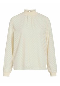 Ligh cream blouse with a high smocked neck, long sleeves, and a herringbone pattern. Cuffs are also smocked for a gathered effect.