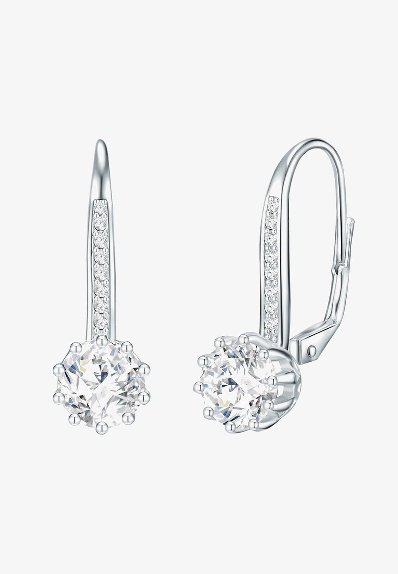 Hõbedased tilga kõrvarõngad, millel on suur ümmargune kristall, mille ümber on väiksemad kivid, ja sujuva, kaarjalt disain. Viimistletud läikiv pind ja lukustussüsteem on nelik.