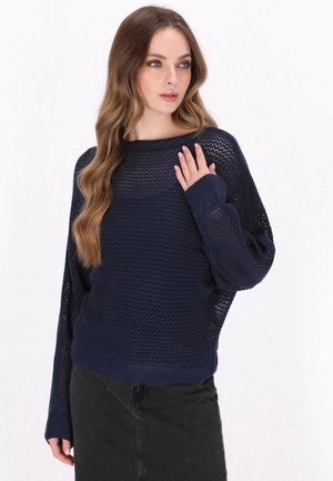 Navy blue knit sweater featuring a loose, breathable mesh design, wide sleeves, and a textured ribbed hem.