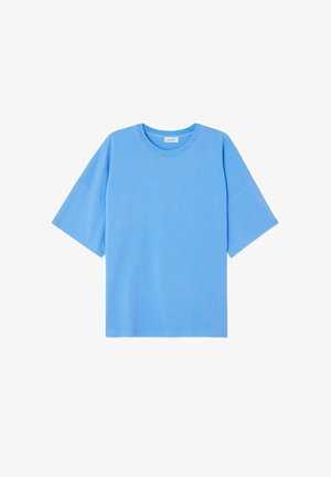 Lichtblauw oversized T-shirt van katoen. Heeft een ronde halslijn en korte mouwen, met een gladde textuur en een eenvoudig ontwerp.