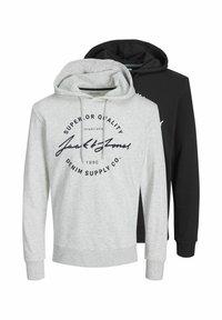 To svedshirts, en lys grå med grafisk print og snor, og en sort med ensartet design. 100% bomuldsstof, afslappet pasform.