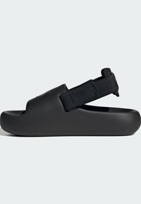Black sandals with a smooth texture, open toe design, adjustable black strap, and a slight cushioning on the sole for comfort.