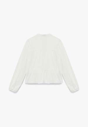 Blusa bianca a maniche lunghe caratterizzata da un motivo testurizzato, orlo posteriore arricciato e polsini elasticizzati, con scollatura rotonda e stile corto.