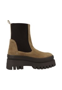 Bottine en daim beige avec panneaux latéraux noirs extensibles, semelle plateforme noire épaisse et languette arrière pour un enfilage facile.