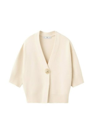 Cárdigan de manga corta color crema con escote en V y cierre frontal en el centro con un solo botón decorativo en forma de sol.