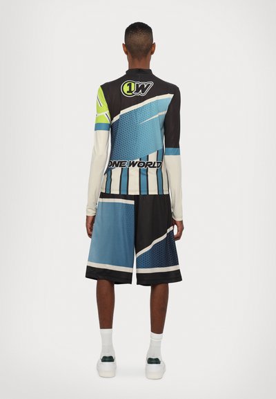 Long-sleeve top and shorts set in blue, black, and white with graphic patterns and the text "ONE WORLD" on the back.