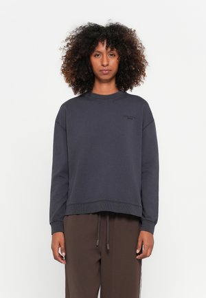 Donkergrijze sweatshirt met een ronde hals, relaxte pasvorm, geribbelde boorden en logo detail op de borst. Gladde katoenen stof.