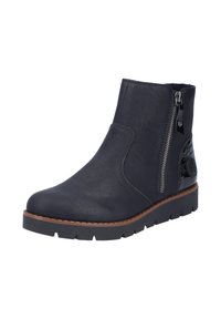 Botte chelsea en cuir noir avec une fermeture éclair latérale, un panneau arrière texturé et une semelle en caoutchouc robuste, dotée d'un crantage brun pour une meilleure adhérence.