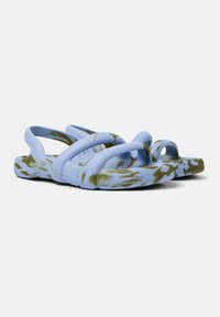 Blue and olive green plastic sandals with a textured surface, featuring multiple crisscross straps and an open-toe design.