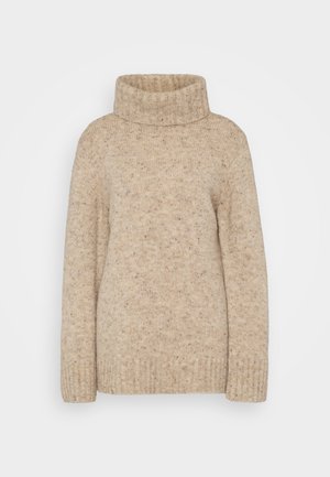 Maglione a collo alto lavorato a maglia beige con colletto a coste, maniche lunghe e una finitura testurizzata con sfumature sottili. Design a vestibilità rilassata.