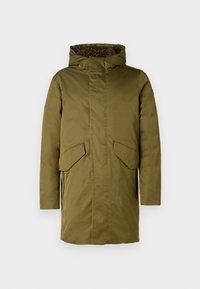 Olivgrüne Parka mit hohem Kragen, fellgefütterter Kapuze, zwei großen frontalen Taschen und geradem Schnitt. Glattes, wasserabweisendes Material.