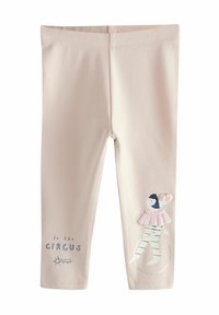 Leggings in cotone rosa chiaro con tema circense, caratterizzati da un'applicazione di un clown e dalla scritta "al CIRCUS" in blu sulla gamba inferiore.