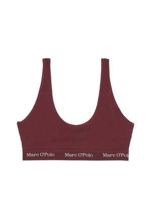 Burgundy bralette made of soft fabric with a scoop neckline. Features a broad elastic band with "Marc O'Polo" printed in white.