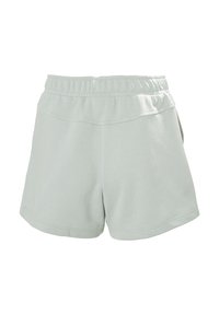 Světlé zelené sportovní kraťasy s elastickým pasem, bočními kapsami a jemnou, hladkou strukturou. Minimalistický design a délka do poloviny stehna.