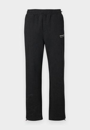 Don't Waste Culture PETRO UNISEX - Tracksuit bottoms - black