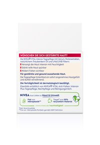 NIVEA VITAL Intensive Day Care box in white with colorful text, detailing ingredients and benefits. Contains recyclable materials.