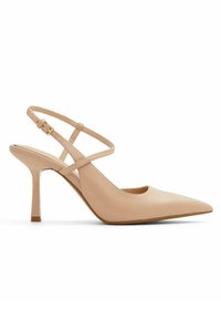 Nude Leder Slingback-Pumps mit spitzem Zehenbereich, zartem Knöchelriemen und 3 Zoll hohen Stiletto-Absätzen; glatte Textur und minimalistisches Design.