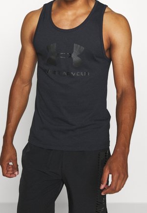 Musta hihaton urheilutoppi pehmeästä materiaalista, jossa on kiiltävä musta Under Armour -logo rinnassa.