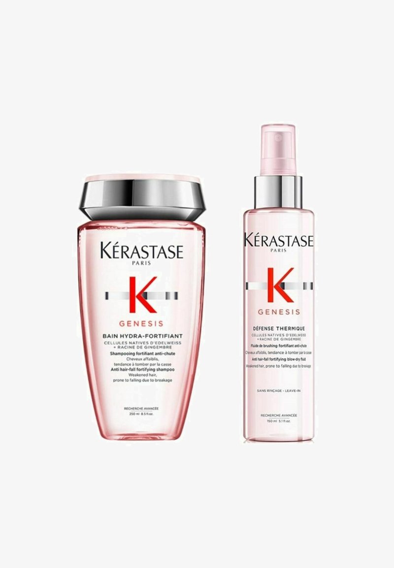 Kérastase Genesis Shampoo und Leave-in Behandlung in rosa Flaschen. Das Shampoo ist hoch und hat einen silbernen Deckel; die Behandlung ist kürzer und hat einen Sprühkopf.