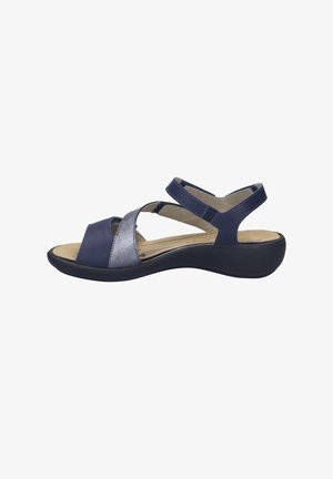 Damessandaal in marineblauw en zilver met gekruiste bandjes, verstelbare enkelbandjes en een gevormde zwarte zool voor comfort.