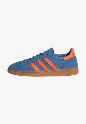 Blue fabric sneakers with orange accents and three stripes. Gum rubber sole, textured upper, and lace-up design.