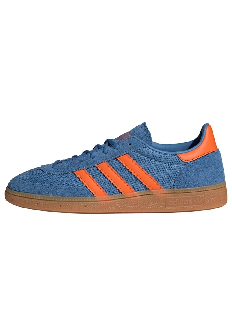 Blue fabric sneakers with orange accents and three stripes. Gum rubber sole, textured upper, and lace-up design.