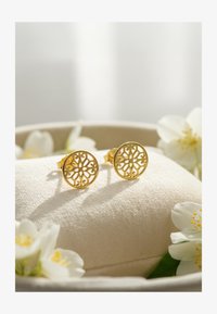 Valgt, gold coloured