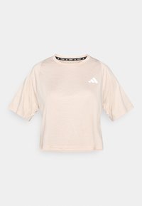 Krótki rękaw, jasno-beżowy, krótki t-shirt wykonany z miękkiego materiału. Posiada czarną taśmę z logo przy dekolcie oraz białe logo po lewej stronie.