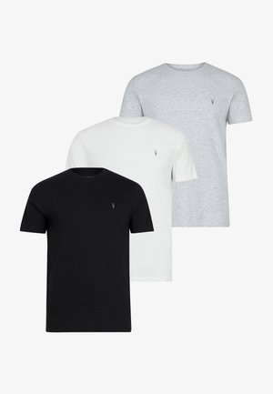 Tre kortærmede T-shirts i sort, hvid og grå. Hver har en rund halsudskæring og et lille logo på brystet, lavet af bomuldsstof.