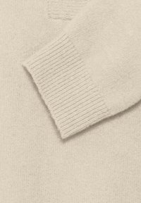 Helebeegist kootud sviiter, millel on pehme tekstuur, soonik cuffs ja ühtlane keha disain. Ei mingeid lisamustreid ega kaunistusi.