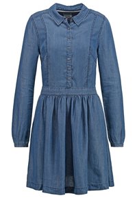 Denim-paitapuku pitkillä hihoilla, napitettava etuosa, kaulus ja kerroksellinen hame. Syvä sininen väri, sileä pinta ja klassinen muotoilu.