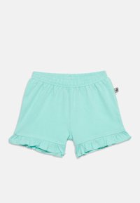 Ανοιχτό μπλε βαμβακερό σορτς με ελαστική μέση και βολάν στα τελειώματα, με μια μικρή υφασμάτινη ετικέτα στη δεξιά πλευρά.