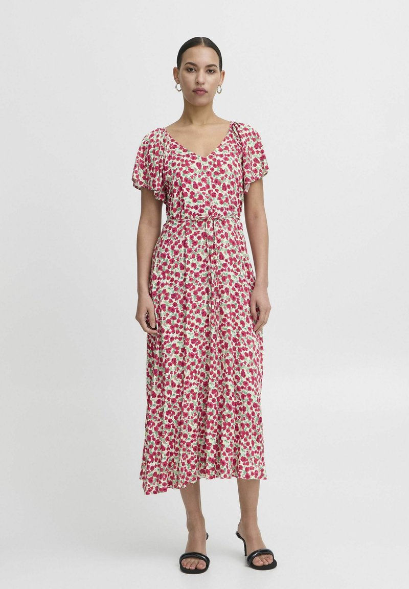 Floral midi dress with short, flutter sleeves, featuring a v-neckline and a drawstring waist. Predominantly white background with pink and green patterns.