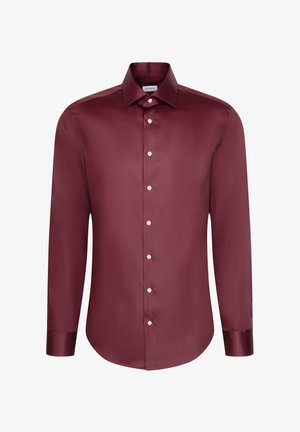 Bordeaux lange mouwen shirt van gladde stof, met een puntkraag en witte knopen aan de voorkant. Getailleerde pasvorm met een gebogen zoom.