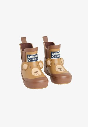 Cizme de cauciuc maro pentru ploaie, cu un design cu fața unei urși, având un vârf maro și un corp mai deschis la culoare. Include o etichetă de marcă pe față.